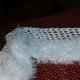 Knitted white stole sa knitting needles